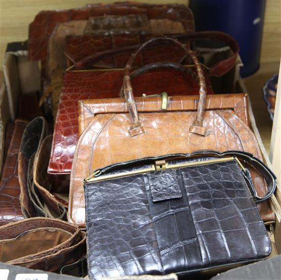 A collection of crocodile handbags. wallets, purses, belts, etc.